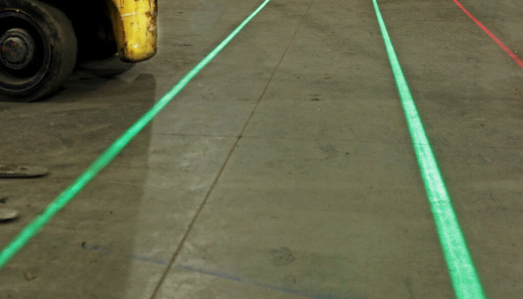 Laser floor marking system. Replaces floor paint and tape. Super bright.